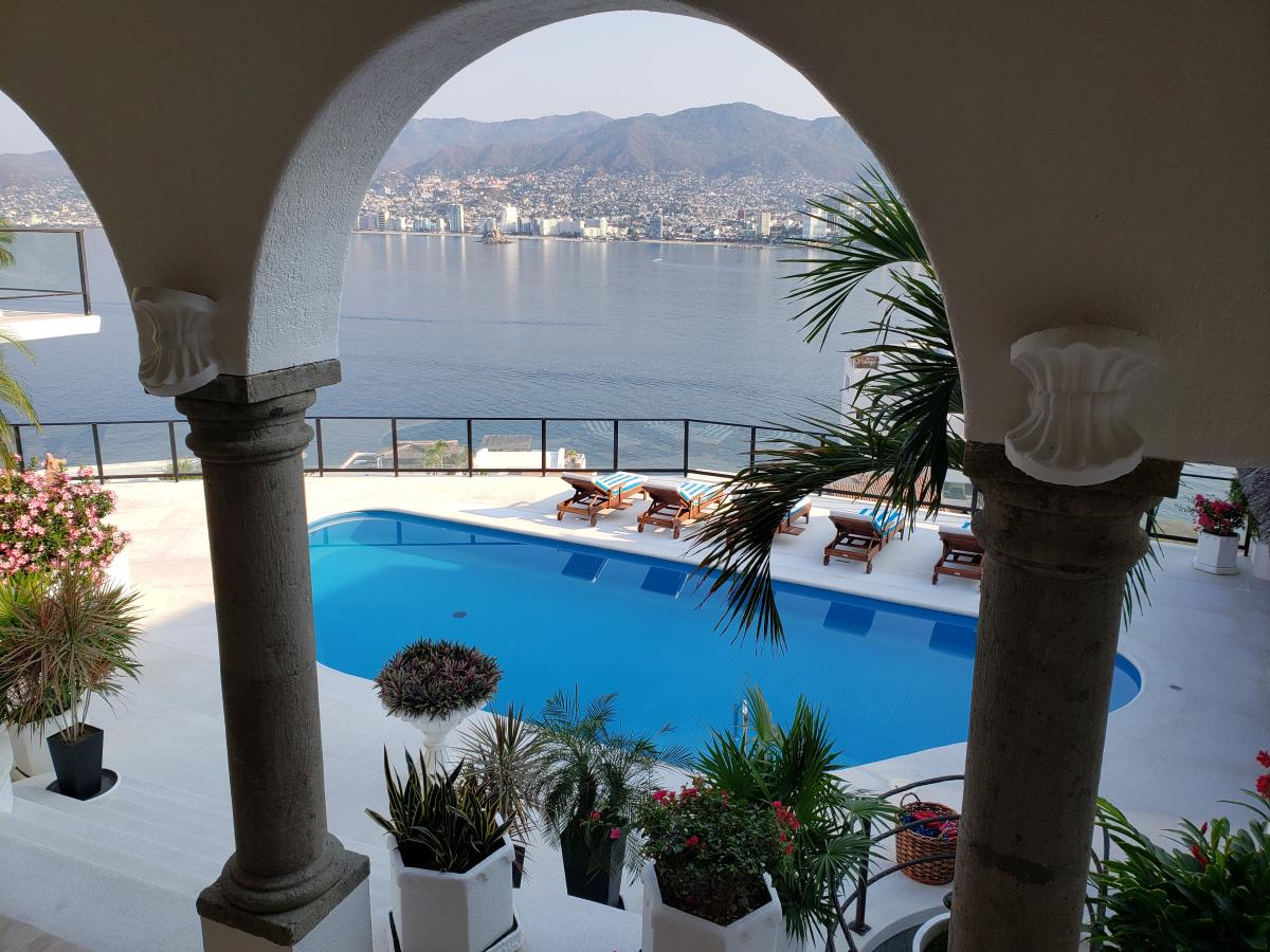 A view of the pool area from inside Casa Buenos Aires in Acapulco.